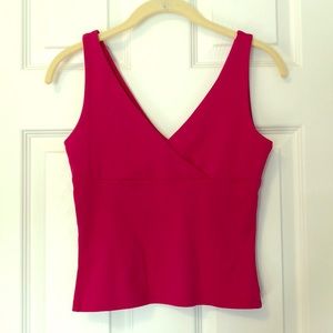 Hot pink crop top.